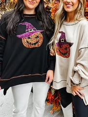 Damegenser med paljetter, gresskar og trollmann til Halloween