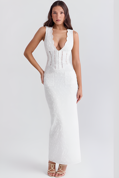 Elegant blondekjole med korsett og blomstermotiv