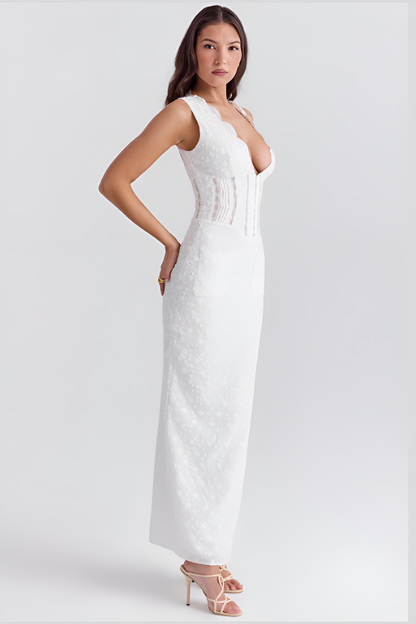 Elegant blondekjole med korsett og blomstermotiv