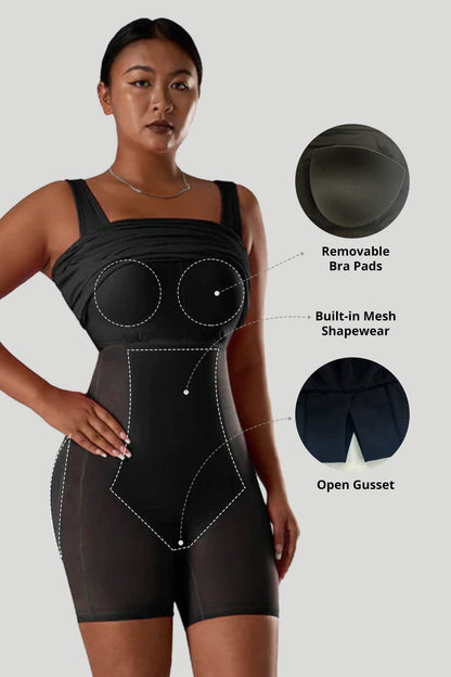 Ensfarget ermeløs kjole med innebygd shapewear
